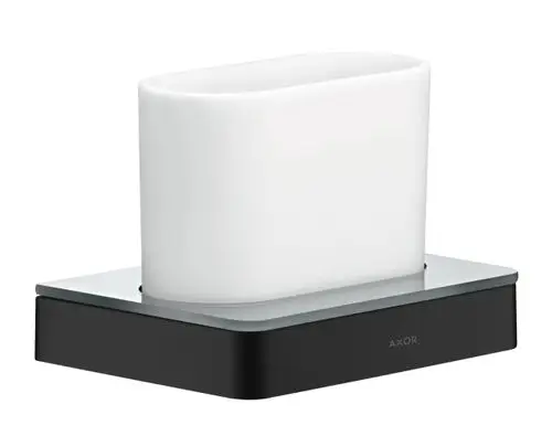 Zahnputzbecher in ovaler Form, aus weißem Material, montiert auf einer mattschwarzen Basis. Hersteller AXOR.